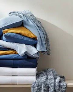 Biancheria e Tessili per la Casa: Comfort, Stile e Qualità - Tutto Tutto Meno Meno®