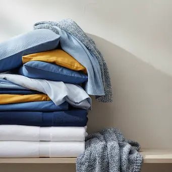 Biancheria e Tessili per la Casa: Comfort, Stile e Qualità - Tutto Tutto Meno Meno®