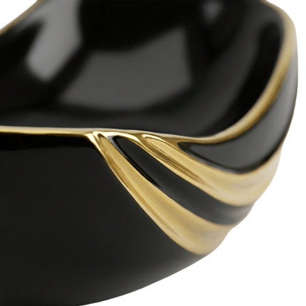 Centro Tavola Scultoreo Dune – Linee Organiche e Profilature Auree
